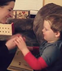 Using Tactile Sign Language To Read With A Child Who Is