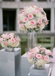 Pink Rose White Hydrangea And Dusty Miller Arrangements Elizabeth Anne De Flower Centerpieces Wedding Wedding Flower Arrangements Floral Arrangements Wedding