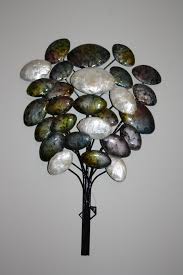 Our extravagant wall art pieces in shimmering metal are created through an elaborate process of welding, polishing and painting. Metal Wall Art Of A Bubble Tree With Free Uk P P