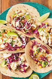 1/2 red onion, thinly sliced, about 1 1/2 cups red wine vinegar, 1/4 cup olive oil, 1 1/2 teaspoons ancho chile powder, 1 1/2 teaspoons dried oregano, 1/2 teaspoon ground cumin, 1/4 cup lightly packed fresh cilantro leaves, chopped, plus more for garnish, 1 jalapeño. 15 Easy Fish Taco Recipes How To Make Fish Tacos Delish Com