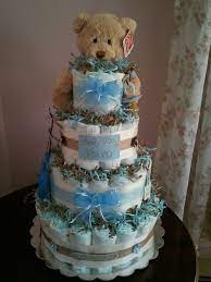 Diaper Cakes And Towel Cakes Baby Diaper Cake Boy Baby Boy Diapers Baby Shower Centerpieces
