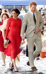 Meghan markle's fashion at the invictus games has earned almost as much attention as her appearances with yes, meghan markle wore a designer 'husband shirt' — here's where to find it! Meghan Markle Accidentally Leaves Tag On Dress Meghan Markle Dress Tag Showing Wardrobe Malfunction
