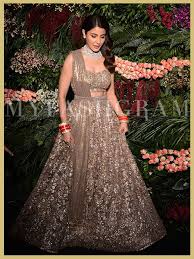 Anushka Sharma In Gold Toned Sabysachi Bridal Lehenga Wedding Reception Mumbai Myfashgram Indian Bridal Outfits Designer Bridal Lehenga Indian Bridal Wear