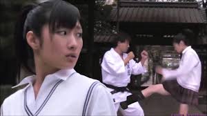 Experience the Rush of Karate Girl Nutshots - Hard-Hitting Action