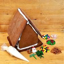 Each gingerbread house comes with a bunch of festive candies, but we hit up dylan's candy bar in person to stock up on even more gummy candies, candy canes and a whole collection of colorful candy accoutrements. Gingerbread House Kit Decorate Your Own House Cinotti S Bakery