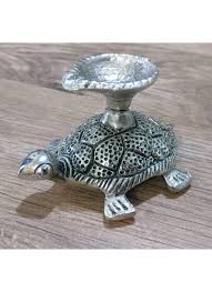 Tortoise egg delivered directly to you. Auspicious Tortoise Diya Candle Stand In White Metal For Home Decor Gift Items Showpiece Elegant Elements 2828714