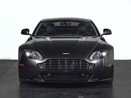 Image result for Jet Black 2010 Aston Martin