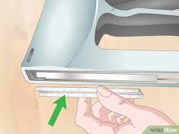 Whether you're loading it with nails or staples, you simply slide the carriage out, load them in, and slide the carriage back in until it snaps. 3 Ways To Load A Staple Gun Wikihow