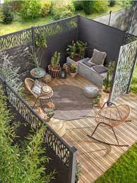 un coin terrasse intimiste et cosy decoration jardin terrasse amenagement jardin mobilier jardin