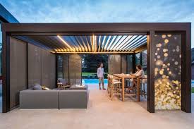 Perfekter Grillplatz Im Garten Mit Feuerschale Und Lamellendach Homify Lamellendach Uberdachung Terrasse Terrassenuberdachung