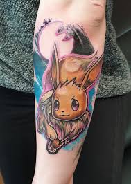 What kind of tattoos look like watercolors? Fresh Eevee Tattoo By Samma Ursa Major Tattoo Studio England Anime Tattoos Tattoo Studio Tattoos