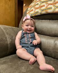 This little cutie is 4 months old ! (We're a few days past 😅) She's 13 lbs  6 oz and 24 inches long ! She's obsessed with chewing