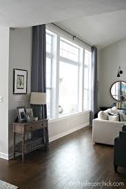 Hardware And Drapes For Big Windows That Don T Break The Bank Big Windows Living Room Large Windows Living Room Living Room Windows