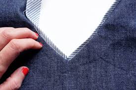 One of the easiest ways to finish a neckline is to just bind it using some bias strips. How To Sew Flat Piping Trim To A V Neckline Weallsew