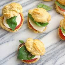 Savory Pate A Choux Shells Filled With Fresh Tomatoes Mozzarella And Basil Profiteroles Food Recipes