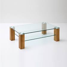 Our coffee tables pack a style punch with designer touches and clever storage. Snowdon Glass Coffee Table Rectangular In Clear And Knotty Oak Coffee Table Wood Table Design Glass Wood Table