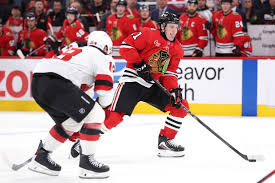 Blackhawks will keep Oliver Moore at center, balance minutes with deeper lineup