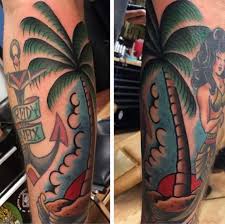 Black and grey palm tree tattoo on forearm. Top 113 Beach Tattoo Ideas 2021 Inspiration Guide
