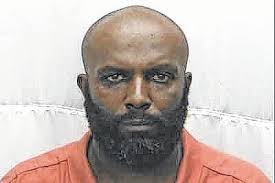 Man with violent past charged in Rockingham car lot stabbing