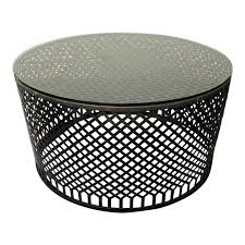 Round tables are easy to move around while square tables pair well with sectionals. Round Metal Base Glass Top Drum Coffee Table Design Plus Gallery