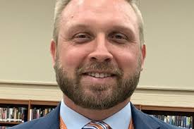 OF Co-workers push McAlpin for supe