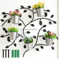 Black Metal Wall Mounted Potted Plants Stand With 5 Circle Holder Tree Design Wall Mounted Plant Holder Plant Stand Tree Designs