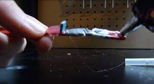 Then, cut a rectangular notch at the top of the foam on both of your web shooters just wide enough to fit the straws into. Simple Easy Spider Man Web Shooter 12 Steps Instructables