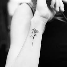 24 Symbolic Lily Tattoo Ideas Lily Tattoo Lily Flower Tattoos Small Lily Tattoo