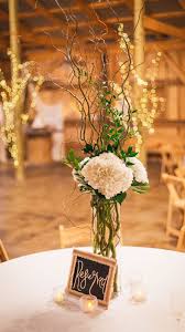 Hydrangeas And Curly Willow Branches Centerpiece Barnweddings Reservedtables Branch Centerpieces Wedding Table Wedding Table Centerpieces