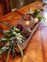 Bread Bowl With Wicker Balls Acorns Greenery And White Blooms As A Farmhouse Table Centerpieces Coffee Table Centerpieces Thanksgiving Decorations Diy Table