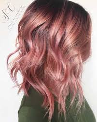 And if you end up detesting the look, all you can do a side part in the blunt bob, with the edges curled in, color in pink undertone. Nice Short Pink Hair Ideas For Young Women