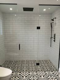 Bathroom tile designs that are anything but boring. Black And White Master Bathroom Bathroom Design Trends Bathroom Trends White Master Bathroom