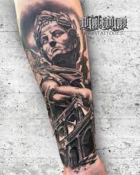 Lucas' back also contains a tattoo of some writing on it but the tattoo has never been fully lucas francois bernard hernandez is a french professional football player who plays for the atletico. Cesar Fusionado Con Coliseo Sobre Lucas Hernandez Greek Tattoos Hercules Tattoo Picture Tattoos