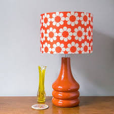 This 1970s red ceramic table lamp was made in several sizes and colours and was probably sold with several different lampshades. Vintage Flowers Burnt Orange Ceramic Table Lamp Retro Table Lamps Ceramic Lamp Base Red Table Lamp