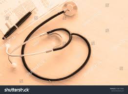 Stethoscope And Medical Documents On Doctor Table On Lightly Orange Background Close Up And View Directly Above Me In 2020 Infographic Design Medical Clinical Trials