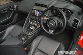 Separated by a more aggressive rear venturi, they are an unmistakable symbol of power. 2014 Jaguar F Type V8 S Review Video Performancedrive
