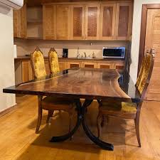 We started making river tables because we couldn't find a coffee table that we really wanted in our home. Walnut Reverse River Table With Black Epoxy 8 Long Lancaster Live Edge