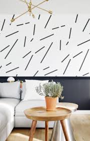 I like there is a table to eat at (or put drinks if you are on the couch) behind the couch, and gives a 2nd row of seating. Warning These 10 Black And White Living Room Ideas Are Downright Intoxicating Hunker