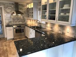 Black pearl granite white cabinets. Tips For Matching Countertops And Cabinetry