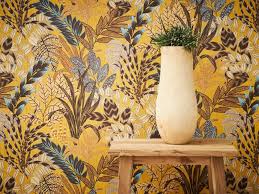 Summery awning stripes and a tangle of wildflowers in a punchy palette make for some seriously fun pattern play. Nala Cape Town Wallpaper With Floral Pattern By Architects Paper
