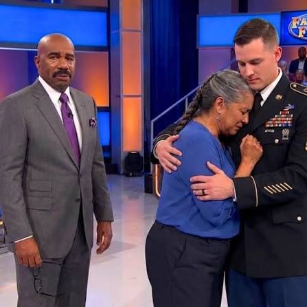 Steve Harvey comforts a grieving mother on Family Feud