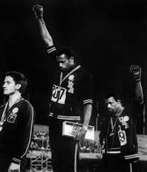 Former us track and field athlete and professional football player john carlos, raises his fist as he speaks during a conference at the national. Black Lives Matter Fist Symbol Meaning And History Behind The Black Power Raised Fist Salute