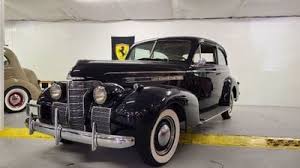 Image result for Trojan Maroon 1939 Oldsmobile