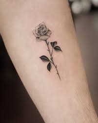 Tangled flower — a symbol of harmony. Simple Rose Tattoo Meaning And Symbolism Body Tattoo Art