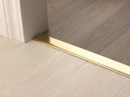 You can install laminate flooring in most rooms in your house but it is not advisable to lay this type of flooring in bathrooms and laundry rooms as they usually have a high moisture level that makes the laminate more prone to if not, trim the door and door jambs to accommodate the raised floor level. Premier Euro Floor Trim No Screws Buy Online Carpetrunners Co Uk