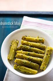 Healthy Drumstick Bhaji Recipe A Steamed And Dry Preparation Of Drumsticks With Spices And Coconut Drumstic Moringa Recipes Goan Recipes Drumstick Recipes