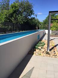 Side Of Above Ground Lap Pool 1 2m Height Means You Do Not Need Pool Safety Fence On The Side Above Ground Swimming Pools Lap Pool Designs Pool Landscaping
