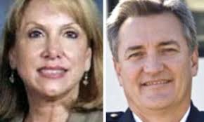 Rebecca Bryan held by police for 'killing' fire chief husband Keith