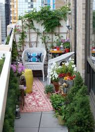 Wicker Chairs Little Corner Table Pillows Rug And Flower Pots Make This Balcony Homey Small Balcony Garden Small Balcony Design Small Porch Decorating