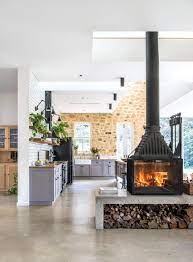 These double sided closed combustion fireplaces come standard with dual glass doors and an ash pan. Cheminees Philippe Radiante 846 2v Wood Fire Double Sided View Brisbane Fireplace Heating Centre